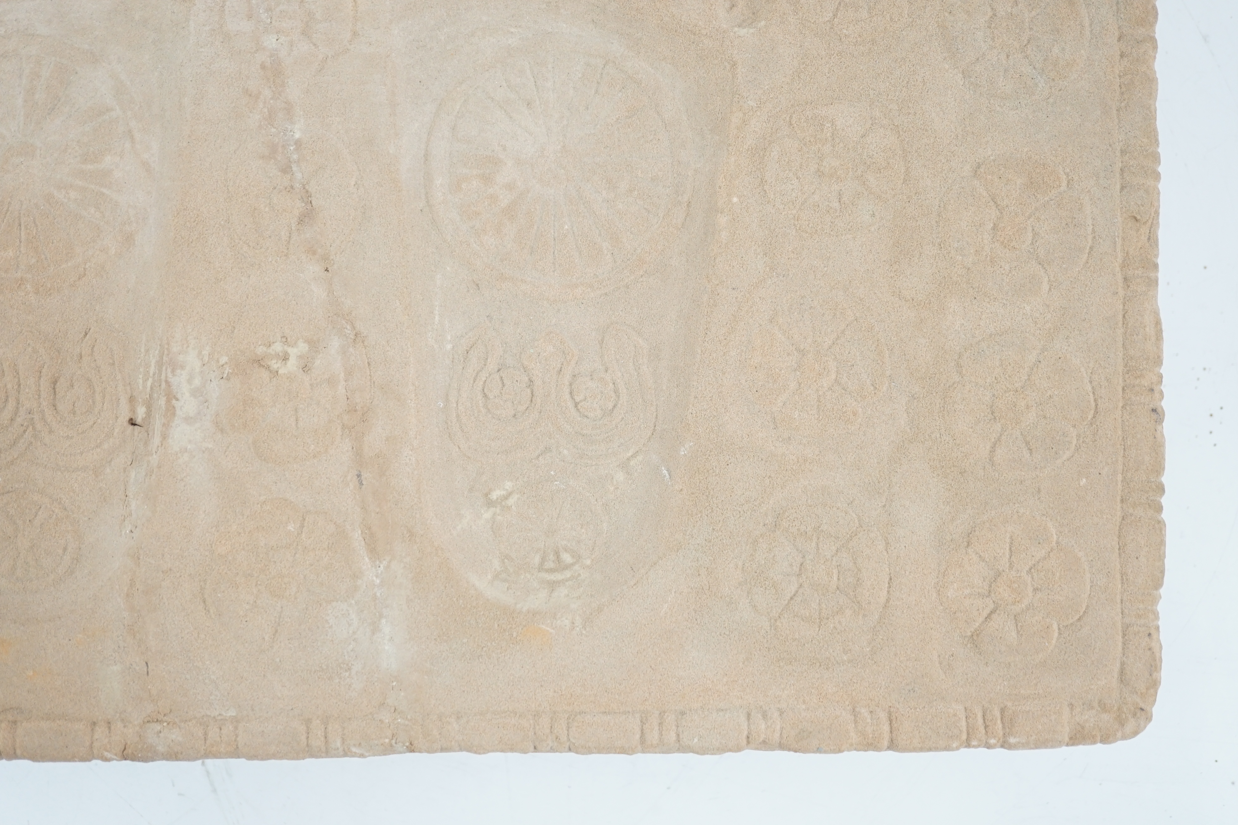 A sandstone relief of Buddha’s foot prints (Buddhapada), Southern India, 12th century